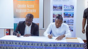 Rivia CEO Isidore Kpotufe signs partnership agreement with PHAoG Greater Accra Chairman